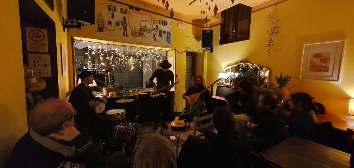 Balkalà performing in an intimate venue