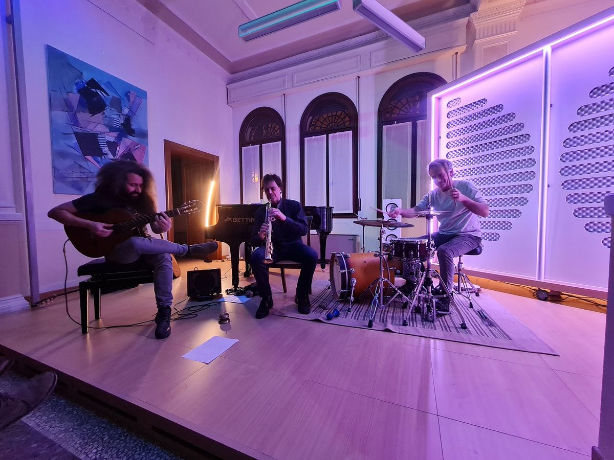 Balkalà performing in a hall