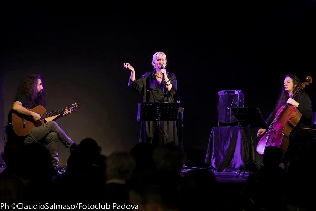 Singer, guitarist and cellist performing together